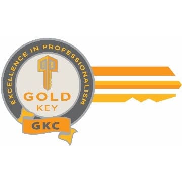 Logo of Gold Key with a key and circular badge design.